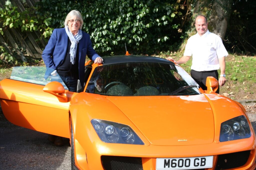 Peter Boutwood with CAI Managing Director Gavin Roberts and a Noble M600